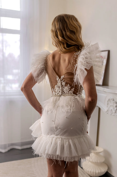 Pearl short wedding dress: Mini reception gown with feathers on the waist and ruffles