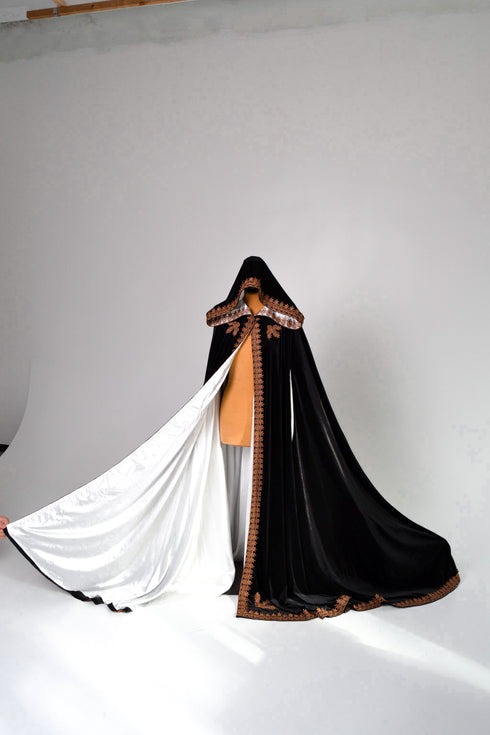 Black cape white lining