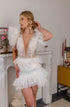 Pearl short wedding dress: Mini reception gown with feathers on the waist and ruffles