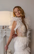 Pearl short wedding dress: Mini reception gown with feathers on the waist and ruffles