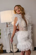 Pearl short wedding dress: Mini reception gown with feathers on the waist and ruffles