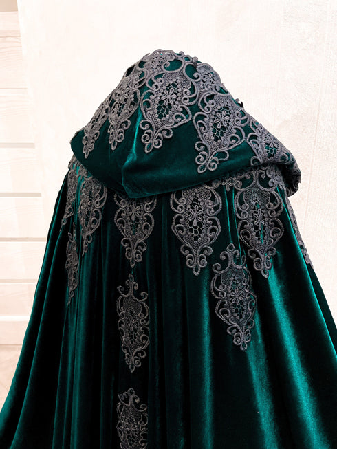 Green cape black lace