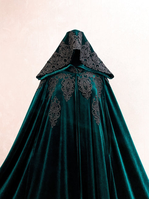 Green cape black lace