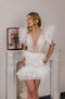 Pearl short wedding dress: Mini reception gown with feathers on the waist and ruffles