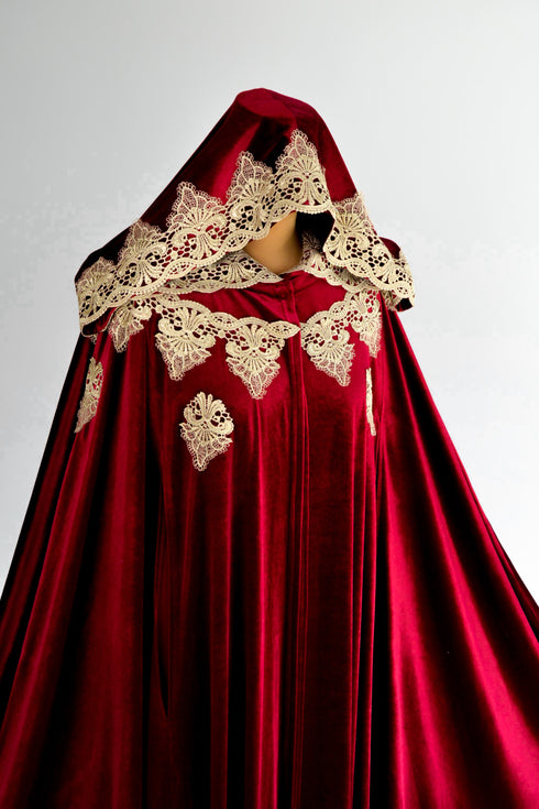 Red cape with a sun
