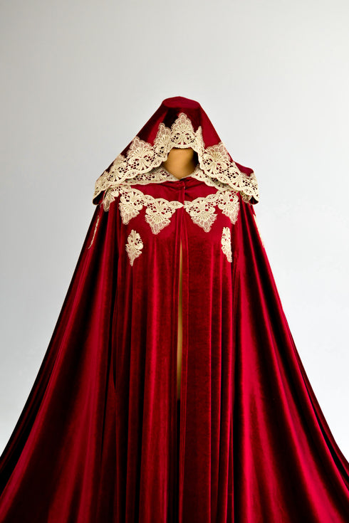 Red cape with a sun