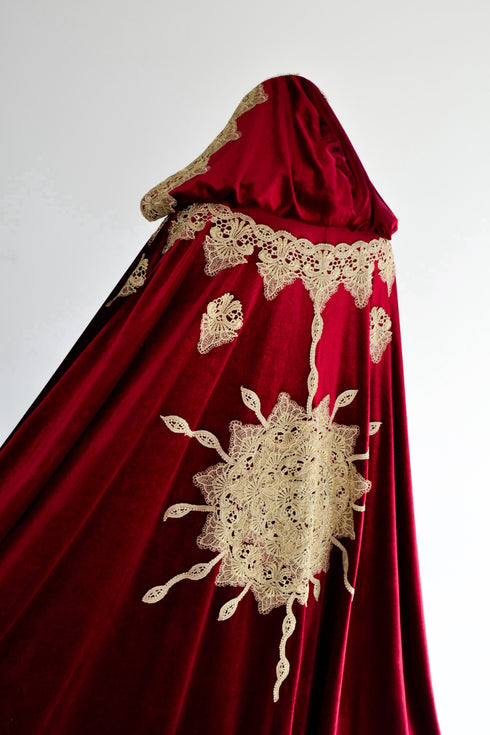 Red cape with a sun