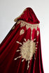 Red cape with a sun