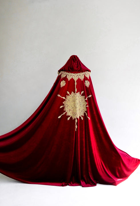 Red cape with a sun