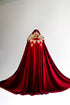 Red cape with a sun