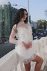 Wedding dress with feathers