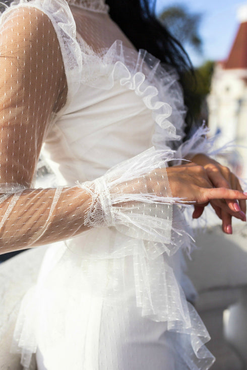 Wedding dress with feathers