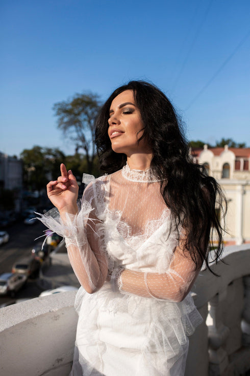 Wedding dress with feathers