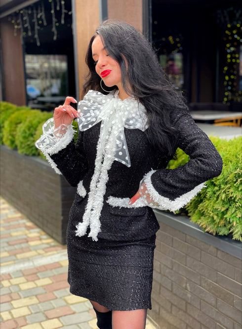 ladies suit Black jacket and skirt with white trim