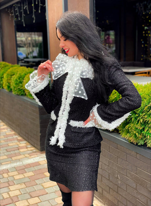 ladies suit Black jacket and skirt with white trim