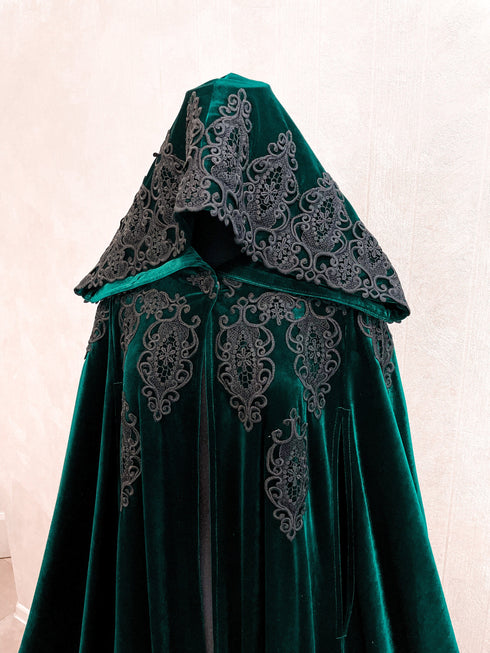 Green cape black lace